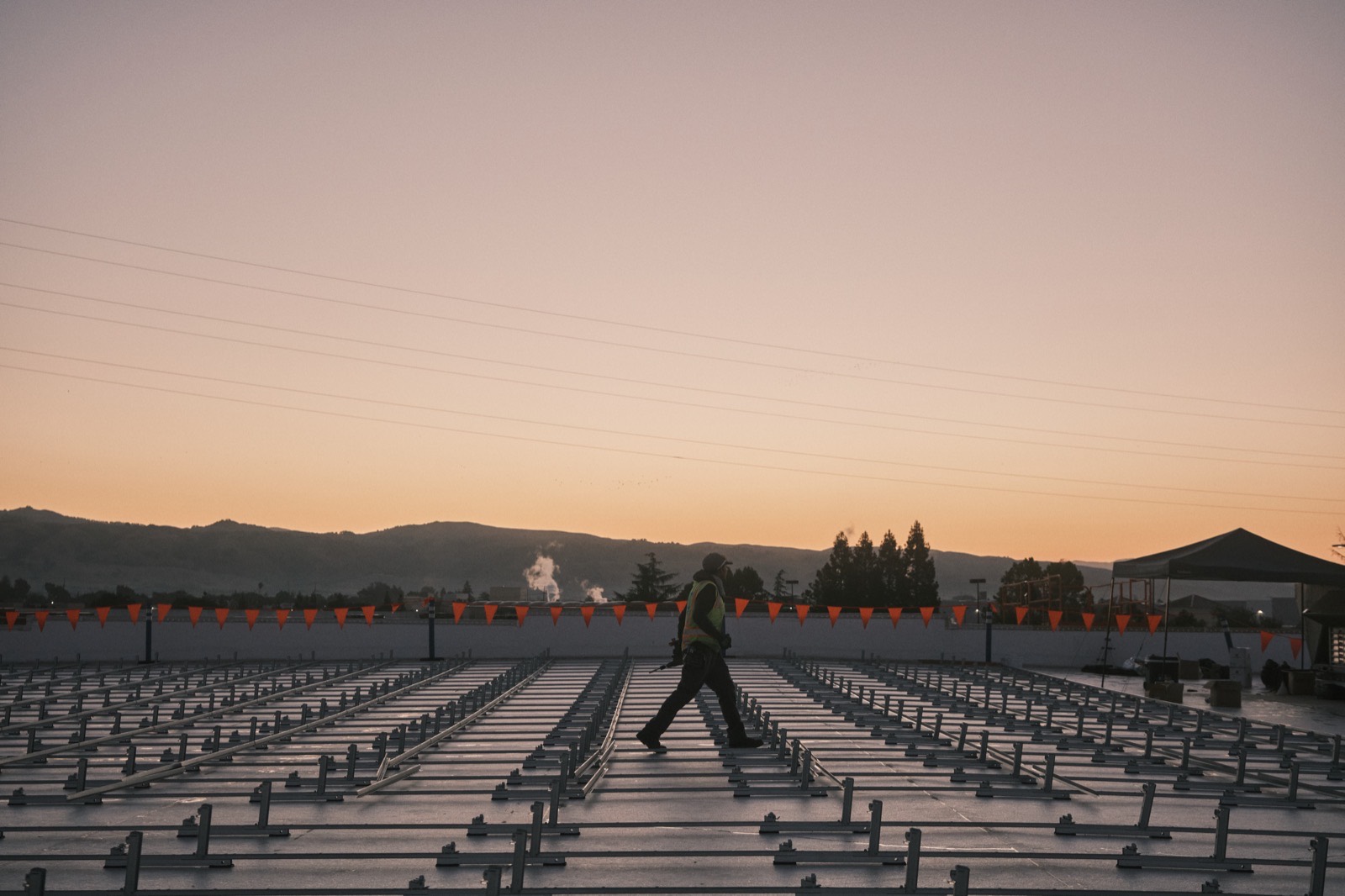MYNT electrician working on a commercial solar installation