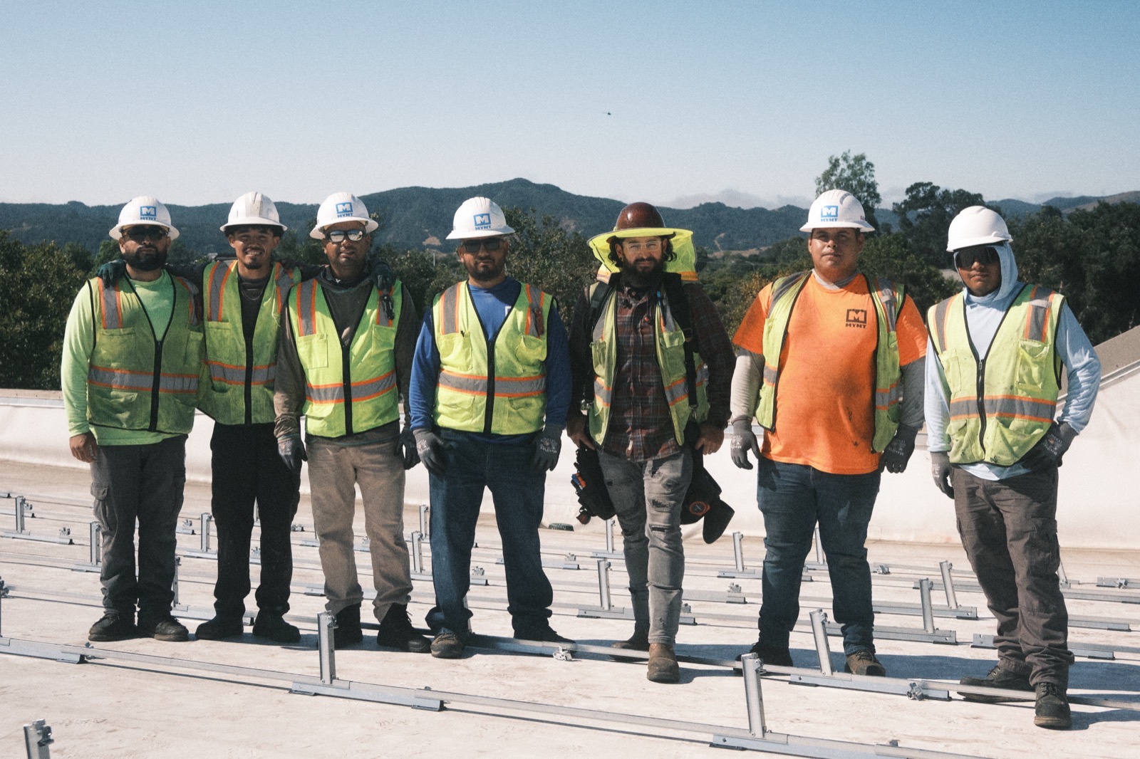 MYNT crew installing rooftop solar panels in California