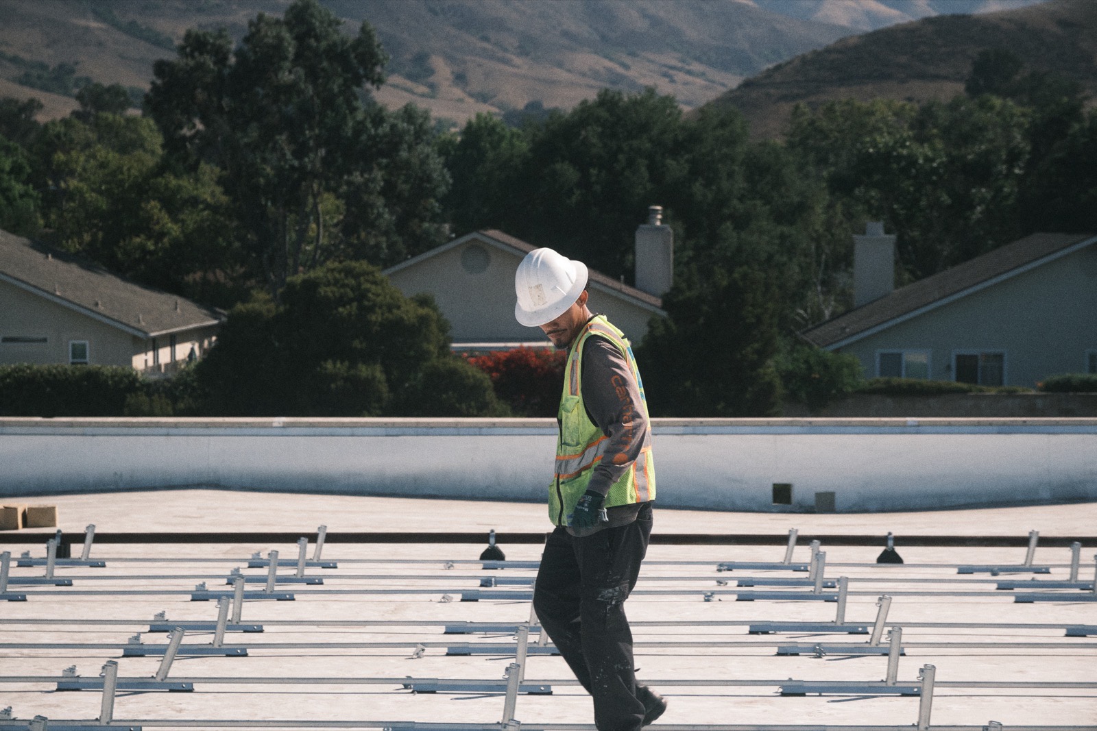 MYNT electrician working on a commercial solar installation