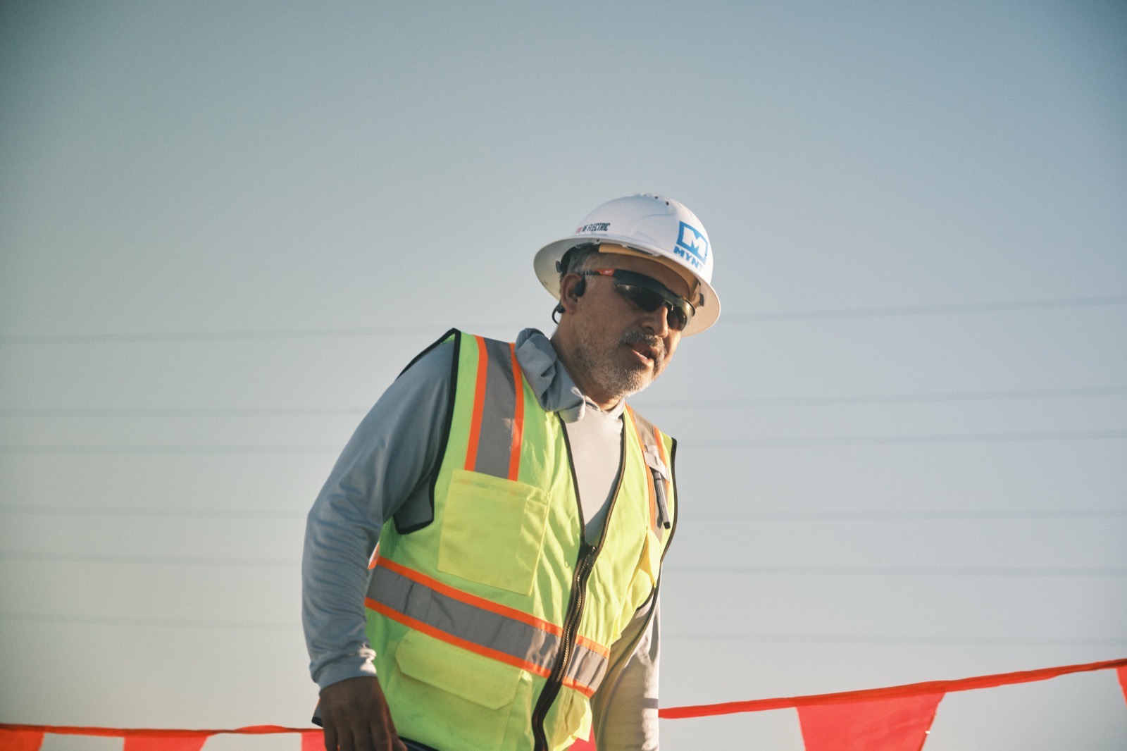 MYNT construction crew working across a solar array